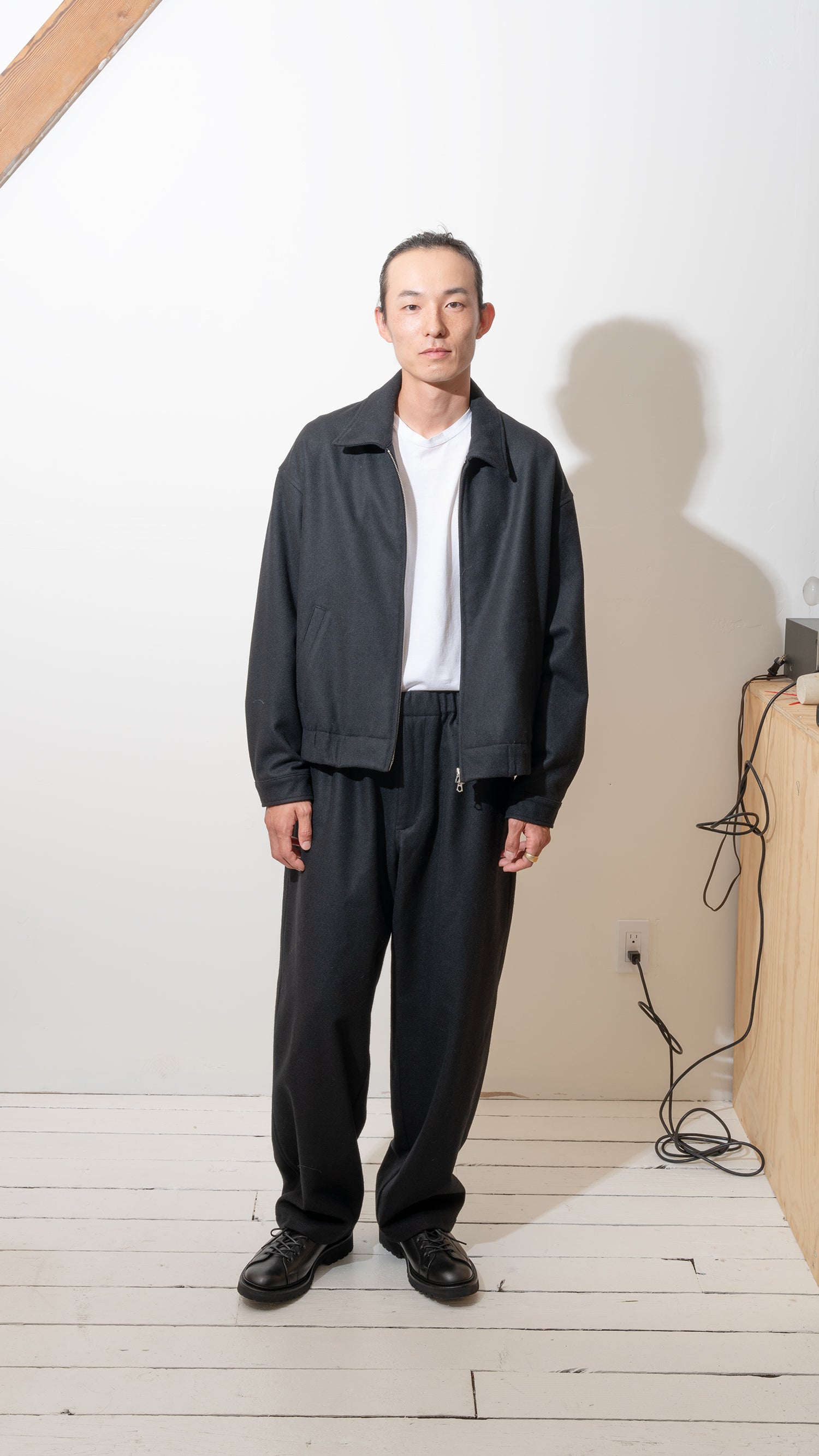 CARRY ON PANT - PIECE DYED BLACK WOOL FLANNEL – James Coward