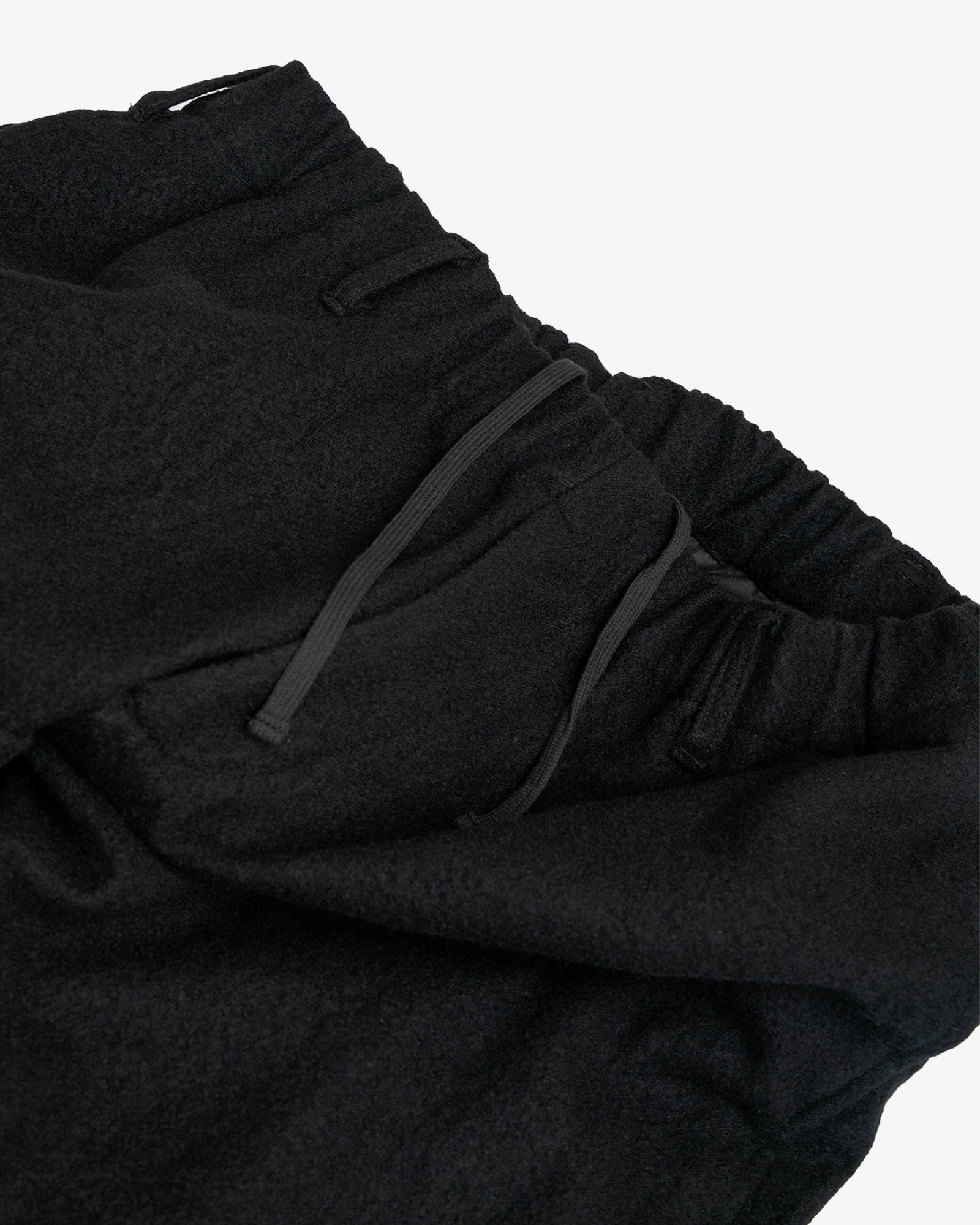 CARRY ON PANT - PIECE DYED BLACK WOOL FLANNEL – James Coward